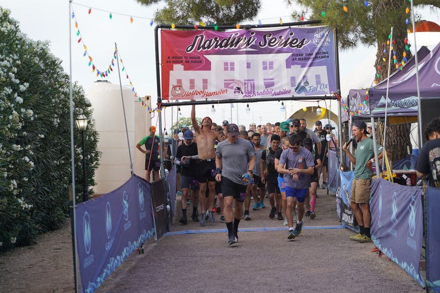 Runners heading out under the Nardini Series start arch