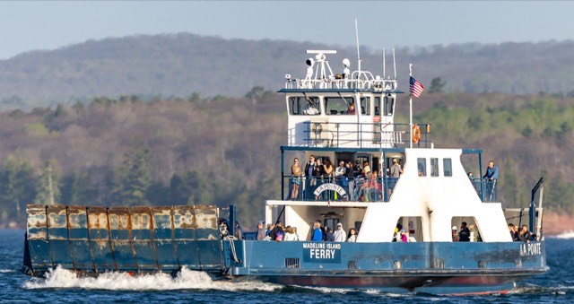The Madeline Island Ferry crossing with runners aboard